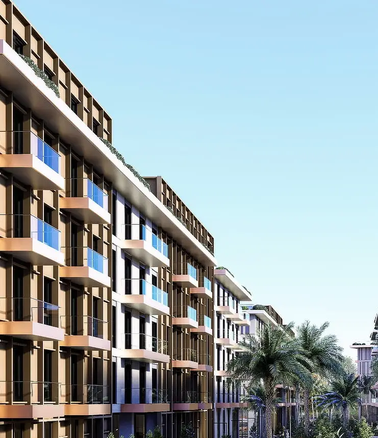 Palm Paradise apartment building with balconies and palm trees against a clear sky