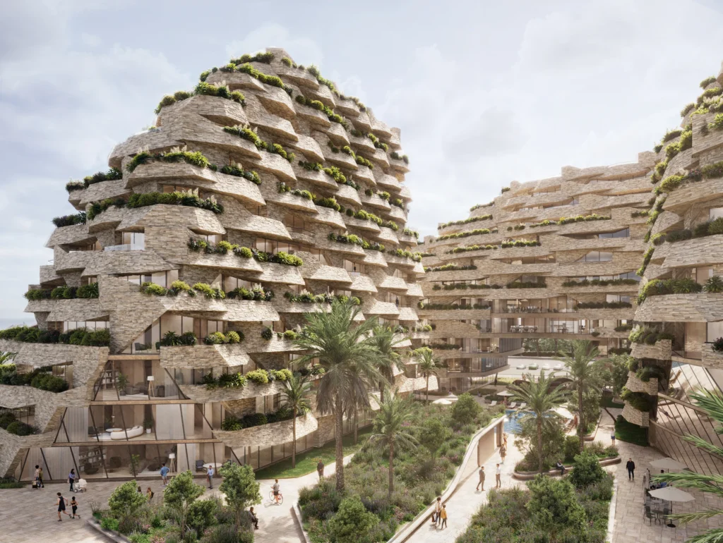 Aerial render of Seastra's terraced buildings with planted balconies around a garden of palm trees and paths, a pool behind