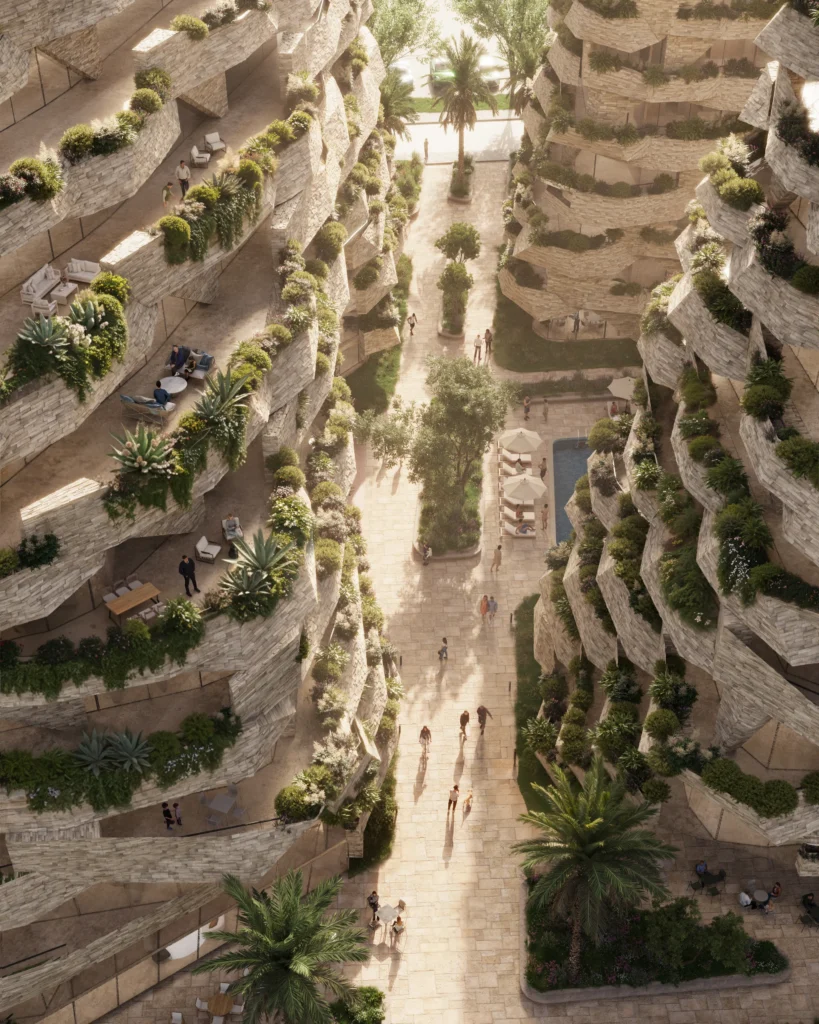Aerial render of a paved walkway between Seastra's terraced buildings, lined with trees and planted terraces, a pool with parasols beside it